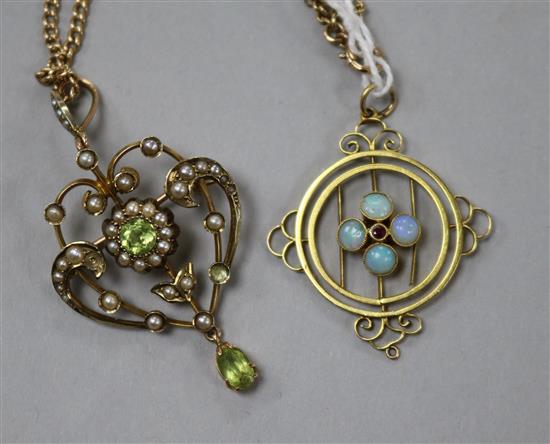 An Edwardian 9ct gold, seed pear and peridot pendant on a 9ct gold chain and one other 9ct gold and white opal pendant.